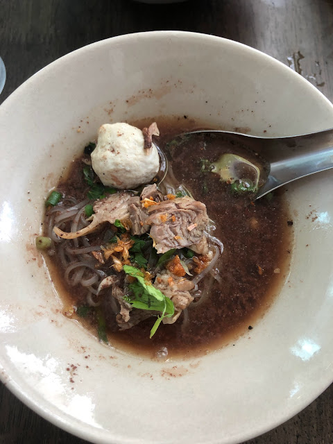 a bowl of boat noodles in Thailand