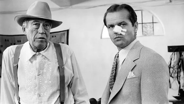 John Huston (pictured left, with Jack Nicholson) plays corrupt and depraved businessman Noah Cross