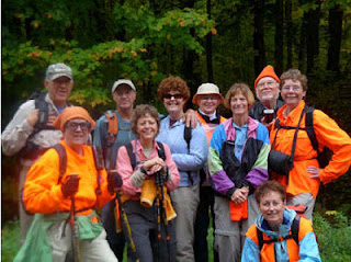 hikers wearing orange