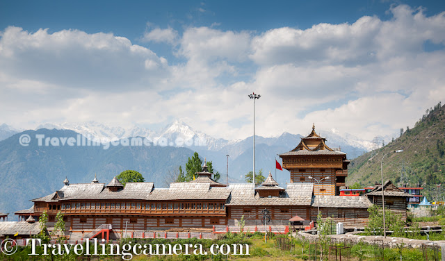 Recently some of us were on Kinnaur Trip and there is place called Jeory on the way. Sarahan is approximately 30 kilometers from Jeory and it's a beautiful town located on hill-top with amazing views of snow covered hills of Kinnaur. Bheemakali temple of Sarahan is most popular place to visit and this Photo Journey shares some of the moments spent around Bheema Kali Temple.Bheema Kali Temple has a huge campus and different temples inside the campus. There are two main temples, out of which one is accessible to everyone during normal days.The Second one is opened on some special occasions and Devi only allows Raja Virbhadra Singh to open the door of that temple. Shri Bheema Kali Temple is located in Sarahan town of Himachal Pradesh in India which is dedicated to the mother goddess Bhimakali, presiding deity of the rulers of former Bushahr State. The temple is situated about 180 km from Shimla and is one of 51 Shakti Peethass. The temple complex has another three temples dedicated to Lord Raghunathji, Narsinghji and Patal Bhairva Ji (Lankra Veer) - the guardian deity.Architecture of Bheema Kali Temple is beautiful. Whole campus is built with Stone and wooden blocks. It seems some part of the campus has not even cement to fix the joints. Whole campus is very well maintained and there is enough security as well.Here is one of the doors of the Bheem Kali temple in Sarahan Town. It's made up of silver with beautiful carving. There is also some text written, mostly in Hindi and Tibbatian scripts. Most of the carved forms are different gods and linked through some old stories.Sarahan was the capital of rulers of former Bushahr State. Bushahr dynasty earlier used to control the state from Kamroo. The capital of state later was shifted to Sonitpur. Later Raja Ram Singh made Rampur as the capital. It is believed that the country of Kinnaur was the Kailash mentioned in Puranas, the abode of Shiva. With its capital at Sonitpur this former princely state was extended up to entire area of Kinnaur where for sometimes Lord Shiva disguised himself as Kirata. Today, the then Sonitpur is known as Sarahan. Banasura, the ardent devotee of Lord Siva, eldest among the one hundred sons of great ablative demon King Bali and the great grandson of Vishnu votary Prahlad, during the Puranic age was the ruler of this princely state.(Courtesy - http://en.wikipedia.org/wiki/Bhimakali_Temple)According to a legend, the manifestation of the goddess is reported to the Daksha-Yajna incident when the ear of the Sati fell at this place and became a place of worship as a Pitha - Sthan. Presently in the form of a virgin the icon of this eternal goddess is consecrated at the top storey of the new building. Below that storey the goddess as Parvati, the daughter of Himalaya is enshrined as a divine consort of Lord SivaThere is a small market around Bheema Kali Temple and there are enough shops to have lunch or light snacks. Apart from that local caps can be bought from this fellow. He was very welcoming and offered good discounts for us :). We had asked for rates in Rampur Market, but he had better stuff and reasonable prices. There are many other shops in the town where some local stuff can be procured. On top of all that, most of the folks were really sweet to interact with.During our visit, we were looking for ladies wearing Dhaatu but couldn't gain the courage to ask anyone to get clicked by us. And just outside the Bheema Kali temple, this lady asked us to click one of her photograph and show her how we click. Probably she was noticing us clicking & reviewing photographs around the temple. We clicked few shots and showed to her. She shared some tips to improve and finally approved few of the shots. After final approval, she invited us to her hotel nearby but we couldn't go because it was time to head back as we had booked guest-house in Jeory.Here is a nearby sight, which is popularly known as Hawa-Ghar. This point has very clear view of Kinnar-Kailash Hills and place was quite windy. We spent around 30 minutes here to enjoy the breeze and take rest. This place is isolated form hustle bustle of the town. When we reached, there was only one person sitting here. Probably this place was least used by localites, as everyone has Hawa-ghar around their own houses :)Whole place was surrounded by Pine or Deodar Forests and smell was awesome in the middle of these forests. It was really an amazing experience to roam around Bheema Kali Temple and Sarahan Town. Meeting different people, visiting one of the amazing temples in this region, Hawa Ghar, a huge house of old kingdom etc.The town Sarahan is known as the gateway of Kinnaur. Down below at a distance of 7 km from Sarahan is the River Satluj. Sarahan is identified with the then Sonitpur mentioned in Puranas.Before entering into the main temple, everyone needs to lock mobiles, wallets or anything else which is made of leather and then wear a cap. Above photograph shows Aneesh wearing the holy cap and standing on right side of lockers everyone gets to keep everything safe. 