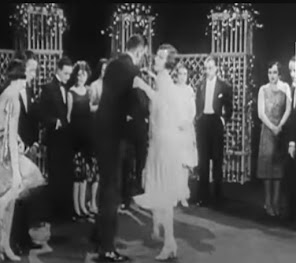 <img src="1920s nightclub.jpeg" alt=" image of dancing in 1920s london " />