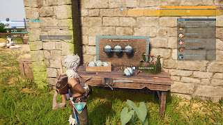 The player toils away at a Sphere Workbench, creating new Pal Spheres.