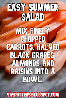 Mix finely chopped carrots, halved black grapes, almonds and raisins into a bowl.