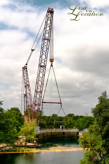 The 400-ton Submarine Theater is lifted out of Spring Lake at Aquarena Center, Texas State University-San Marcos. Photo by Lisa On Location photography.