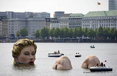 A Huge Mermaid Statue in Water