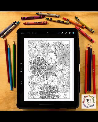 A floral coloring page opened in the Procreate app on an ipad rests on a wooden table. It is surrounded by Crayola Crayons.