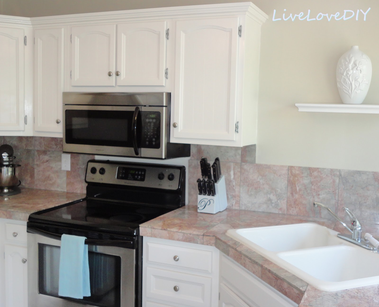 LiveLoveDIY: The Chalkboard Paint Kitchen Cabinet Makeover