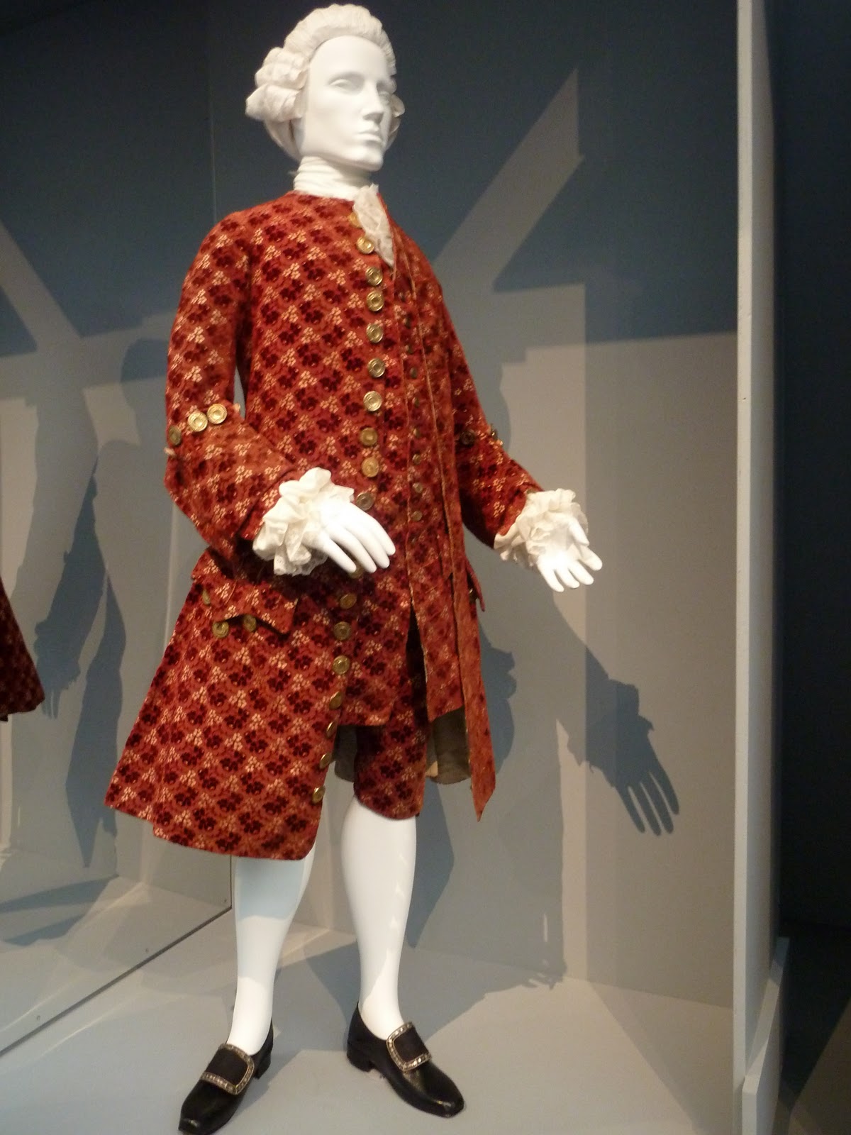 short hairstles front feathered into longer back The Three Piece Suit from 1755!