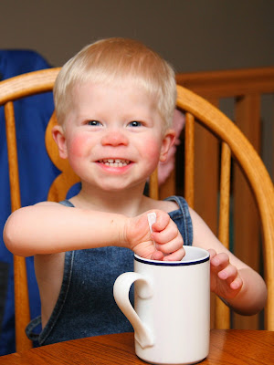 Owen stirring his easter egg