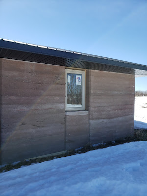 Greenbuilding passive solar earth house