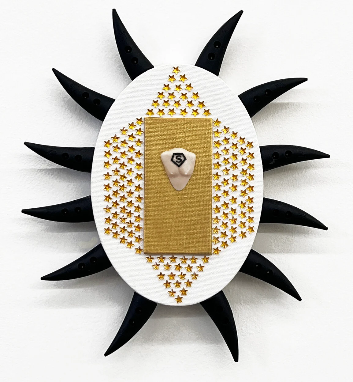 Presumptions of Power, 2024, Resin, gems, vinyl lettering, acrylic, canvas, and rubber on canvas, 11” h 9” w x 1” d (Photo credit www.arlenerush.com)