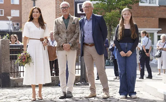 Crown Princess Mary wore a bespoke checked dress by Danish designer Morten Ussing. Ralph Lauren bag and Max Mara belt