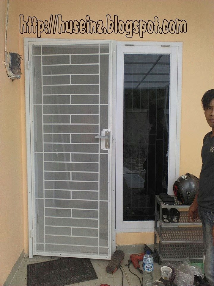 Pemasangan canopy pintu  dobel teralis  di villa tanah 