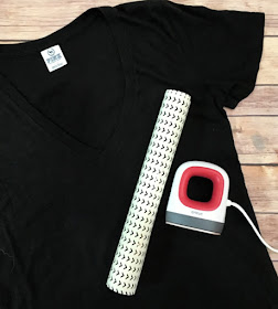 The Cricut EasyPress Mini is the newest addition to the EasyPress family and I am putting it to work and showing you how to add a faux pocket to a plain t-shirt using patterned iron on.