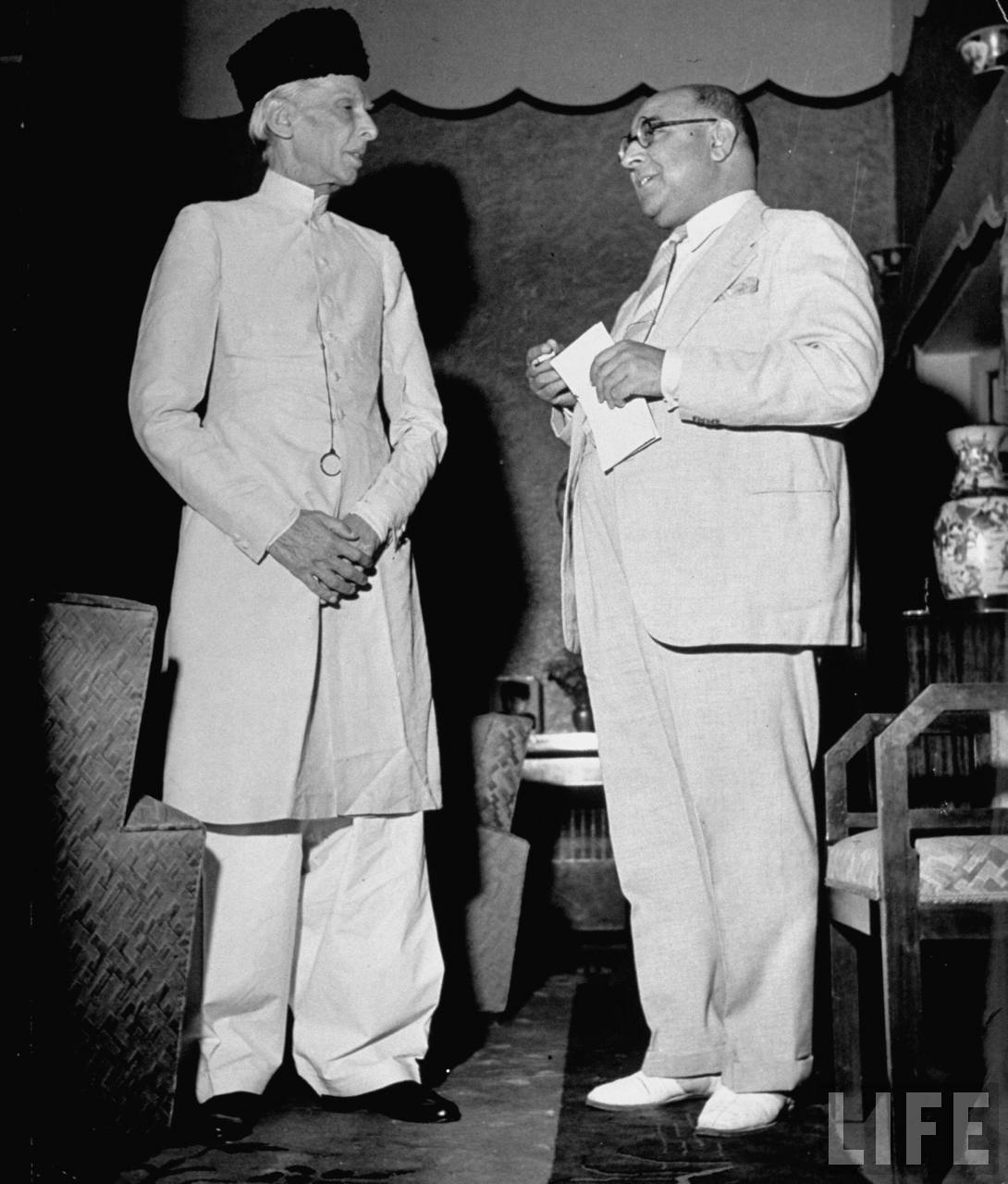 Mohammed Ali Jinnah, President of India's Moslem League in conversation with Nawazawa Liaquad Ali Khan at a political meeting - New Delhi May 1946