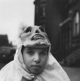 Untitled (boy with mask atop head)