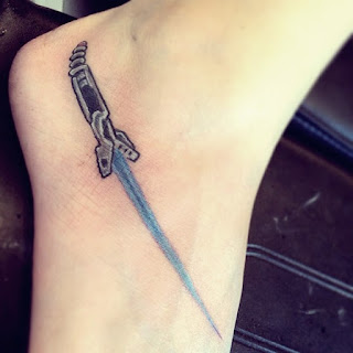 star trek tattoo of sword on foot