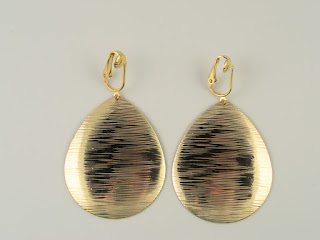 http://www.thecliponearringstore.com/luxury-awaits-brushed-teardrop-clip-on-earrings.html