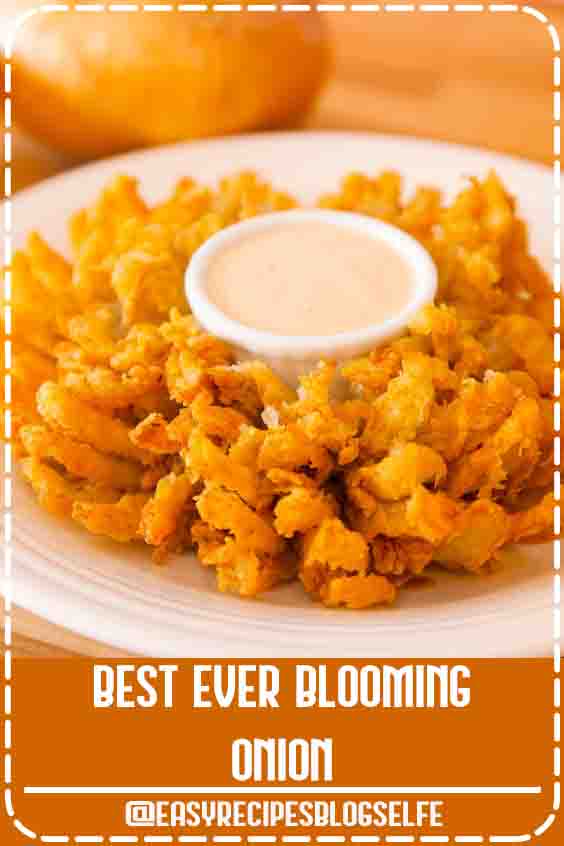 Blooming Onion – Crispy, batter-fried onions that resemble flower pedals at Outback Steakhouse! This is an easy and impressive looking appetizer that’s great to share. All you need is a few simple ingredients. Follow this video recipe on how to slice and fry a blooming onion. | Quick and easy recipe, vegetarian. Party appetizer. Video recipe | Tipbuzz.com #EasyRecipesBlogSelfe #BloomingOnion #quickand #EasyRecipesforTwo #simple