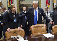 General Motors CEO Mary Barra, along with the chief executives of Ford and Fiat Chrysler, met with President Trump at the White House in January 2017 to discuss U.S. auto emissions standards. (Credit: Saul Loeb/Getty Images) Click to Enlarge.
