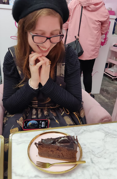 woman looking at cake