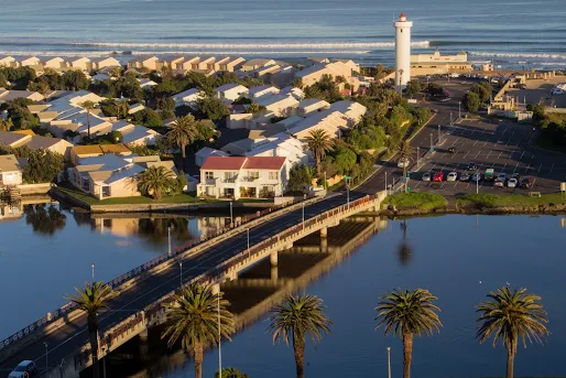 Copyright Vernon Chalmers Lighthouse over Milnerton Lagoon / Woodbridge Island Cape Town - From Arnhem