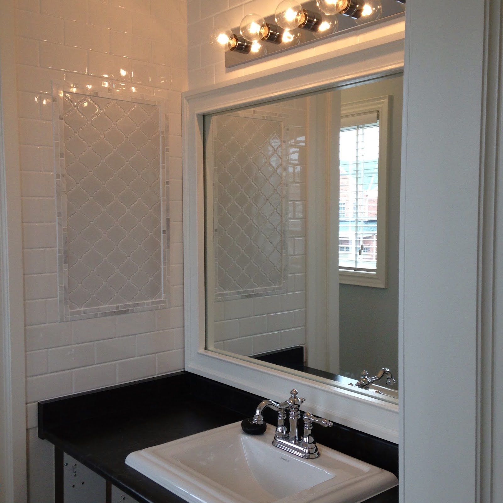 white wood : weekend bathroom updatehow to frame a bathroom mirror