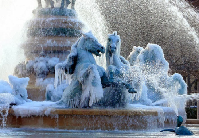 Paris, France. - Winter Blast Transforms Water Fountains Into Magical Ice Sculptures