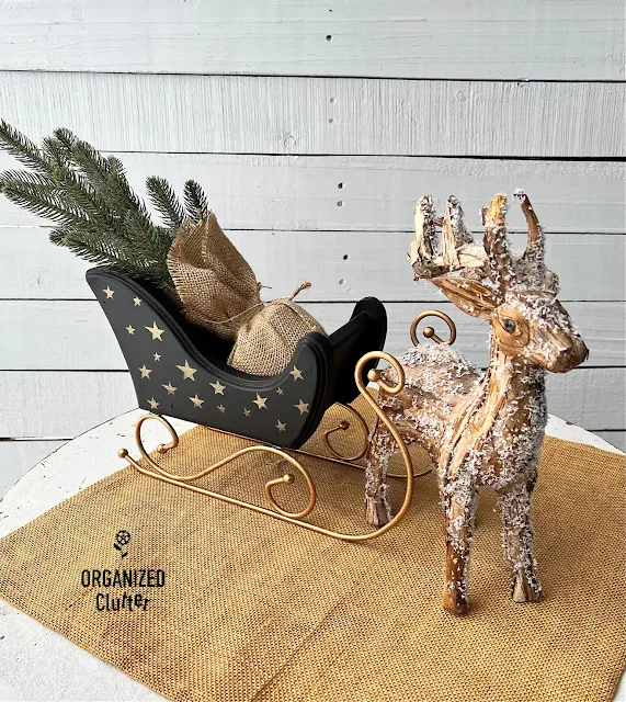 Photo of an upcycled wooden & metal Christmas sleigh decoration.