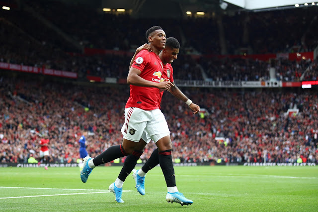 Marcus Rashford and Anthony Martial celebrating Manchester united goal against chelsea