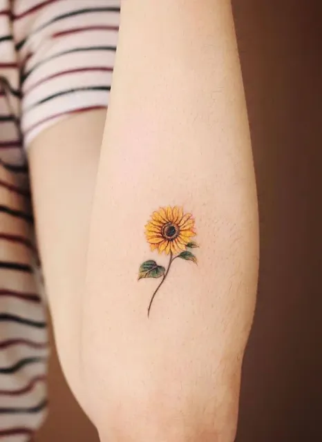 small sun and moon tattoo