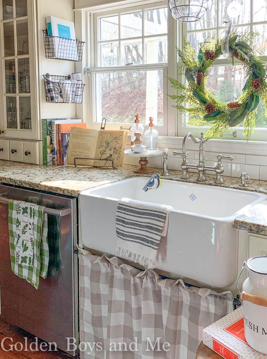 Farmhouse sink in cottage style kitchen with DIY sink skirt - www.goldenboysandme.com