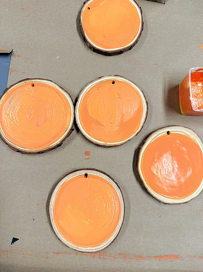 orange painted wood slices
