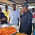 Governor Shettima eats akara while inspecting school in Maiduguri after 2 years of closure