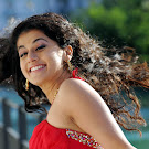 Tapsee Stills in Red Dress  Photo Gallery