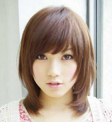 Model rambut pendek wanita pixie long bangs