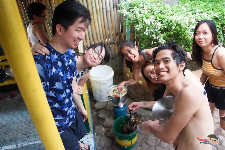 Family bonding while cooking the crab in Dream Wave Resort