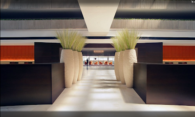 color photo of large planter urns, lobby view, Hyatt Regency O'Hare hotel near Chicago O'Hare airport