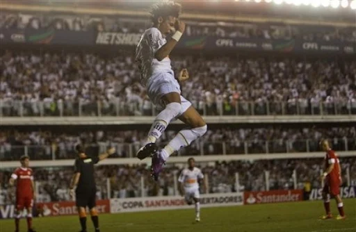 Santos striker Neymar celebrates after scoring his second goal against Internacional