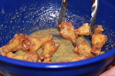 chicken wing sauce with garlic, parmesan, roasted garlic, spicy garlic, marsala sauce, these chicken wings are fried and coated with homemade chicken wing sauce