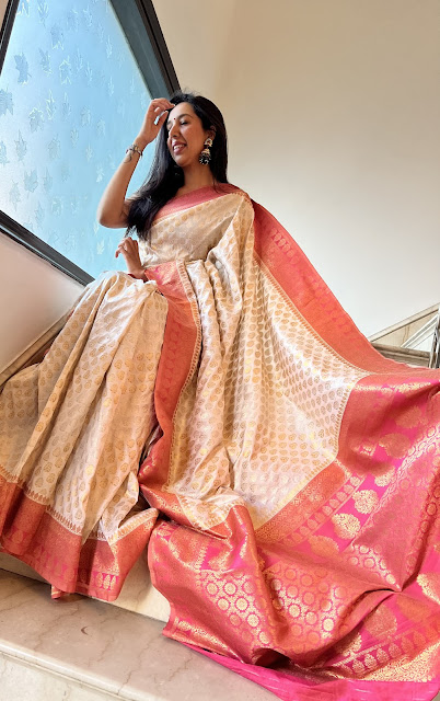 Pure katan silk. Sona Rupa butis. Coral border and pallu.