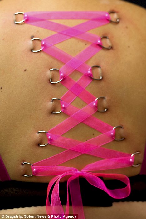 body modification piercings. craze in ody modification