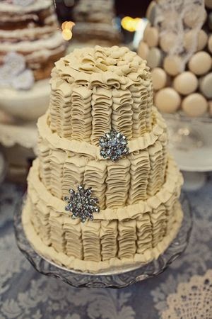 A very chic two tier black and white wedding cake from Sweet Bloom Cakes