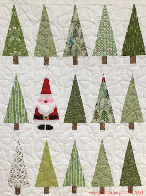 Maria's Christmas Tree Quilt, quilted at Fabadashery Longarm Quilting