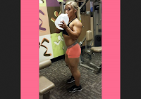 Muscular female bodybuilder in a stunning posing
