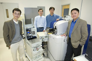 (From left) Peidong Yang, Mingquan Guo, Woong Kim and Daojing Wang have developed multinozzle nanoelectrospray emitter arrays that enable mass spectrometry to be fully integrated with microfluidic technology for proteomics research.