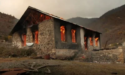 Ethnic Armenian villagers burn houses