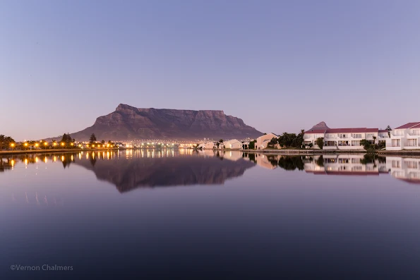 Copyright Vernon Chalmers: Before sunrise: Table Mountain / Cape Town over Milnerton Lagoon