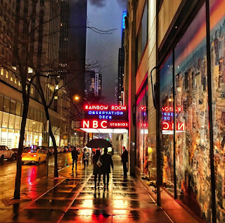 Couple walking on rainy street