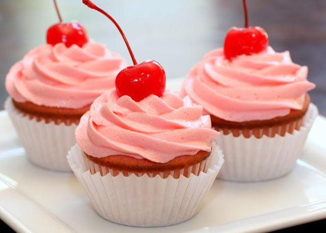 Here is one of my favorite resent pictures Cherry Almond Vanilla Cupcakes 